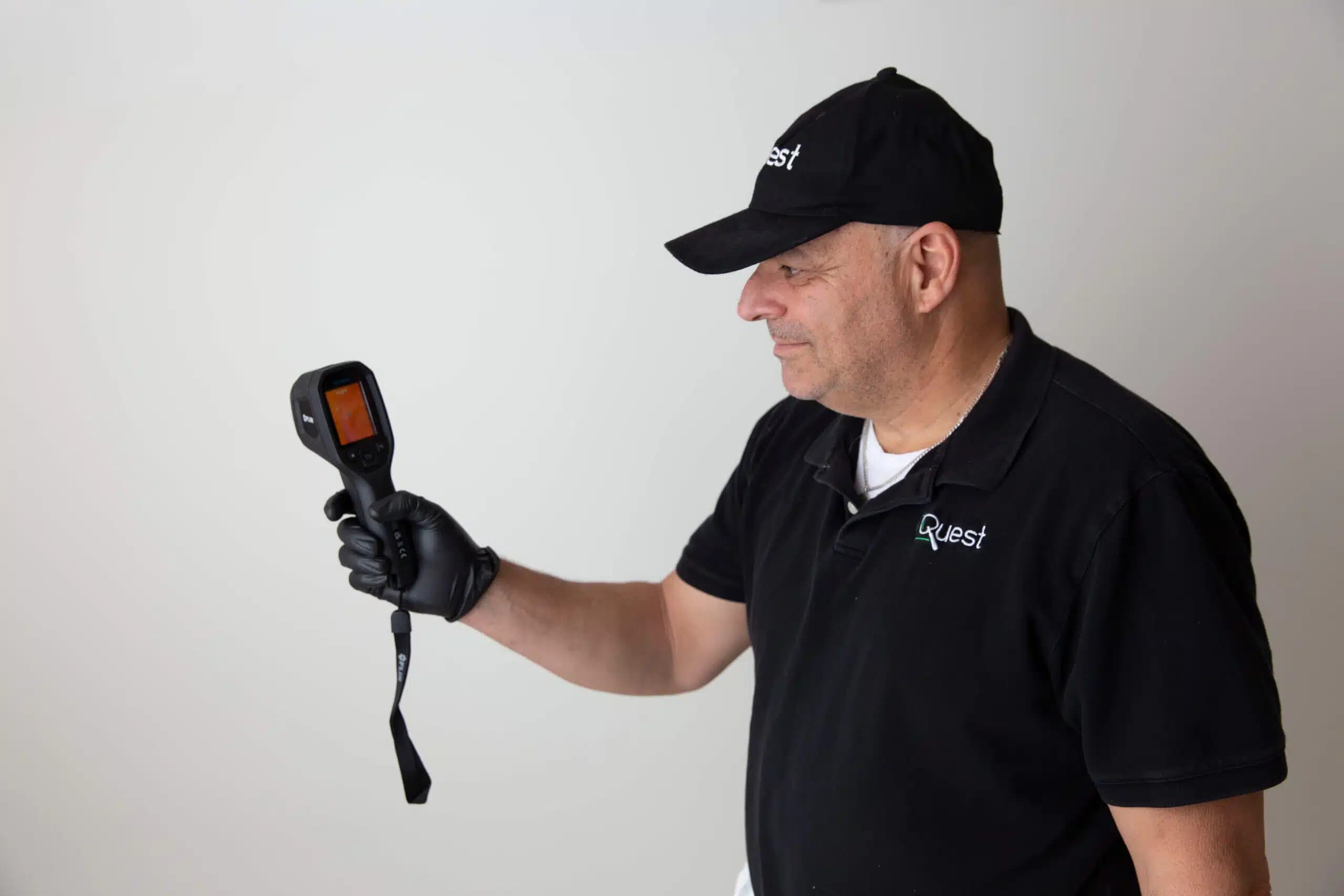 Inspector assessing a property for mold and moisture