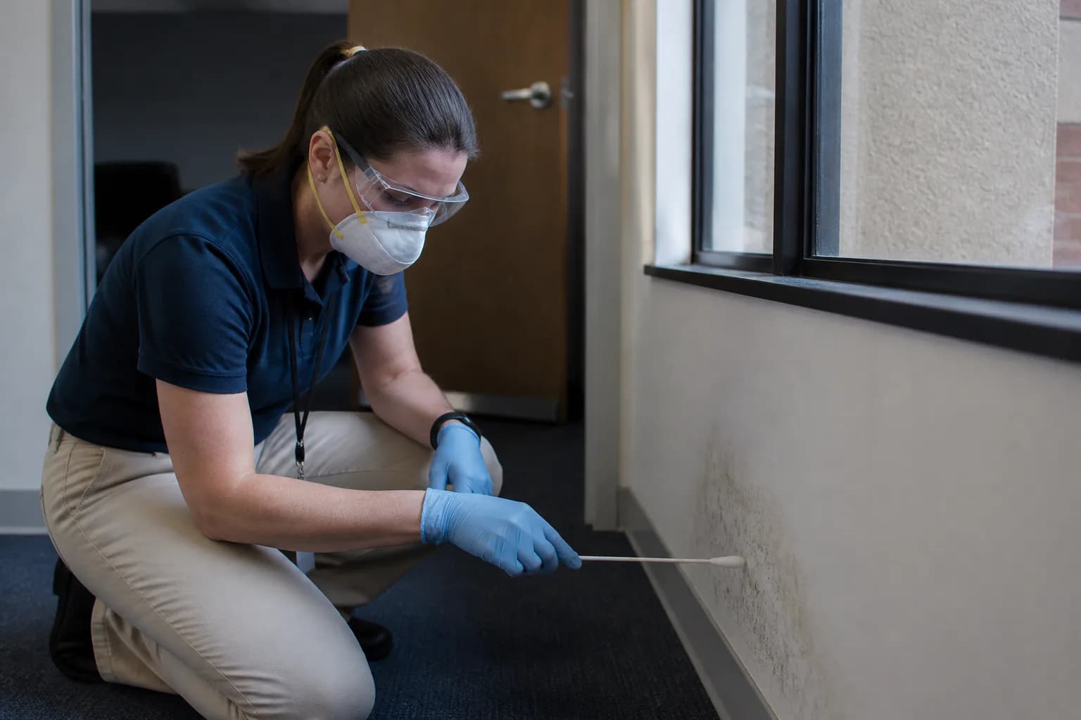 High-Risk Areas for Mold Surface Testing, shown in a professional environmental inspection setting